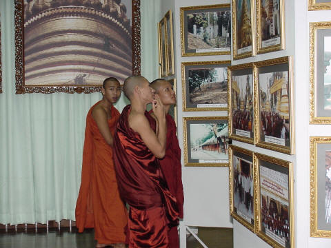 Monks study monk photos in National Museum - Click For Full-Size Photo