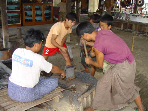 Intha metal workers make a knife- Click For Full-Size Photo